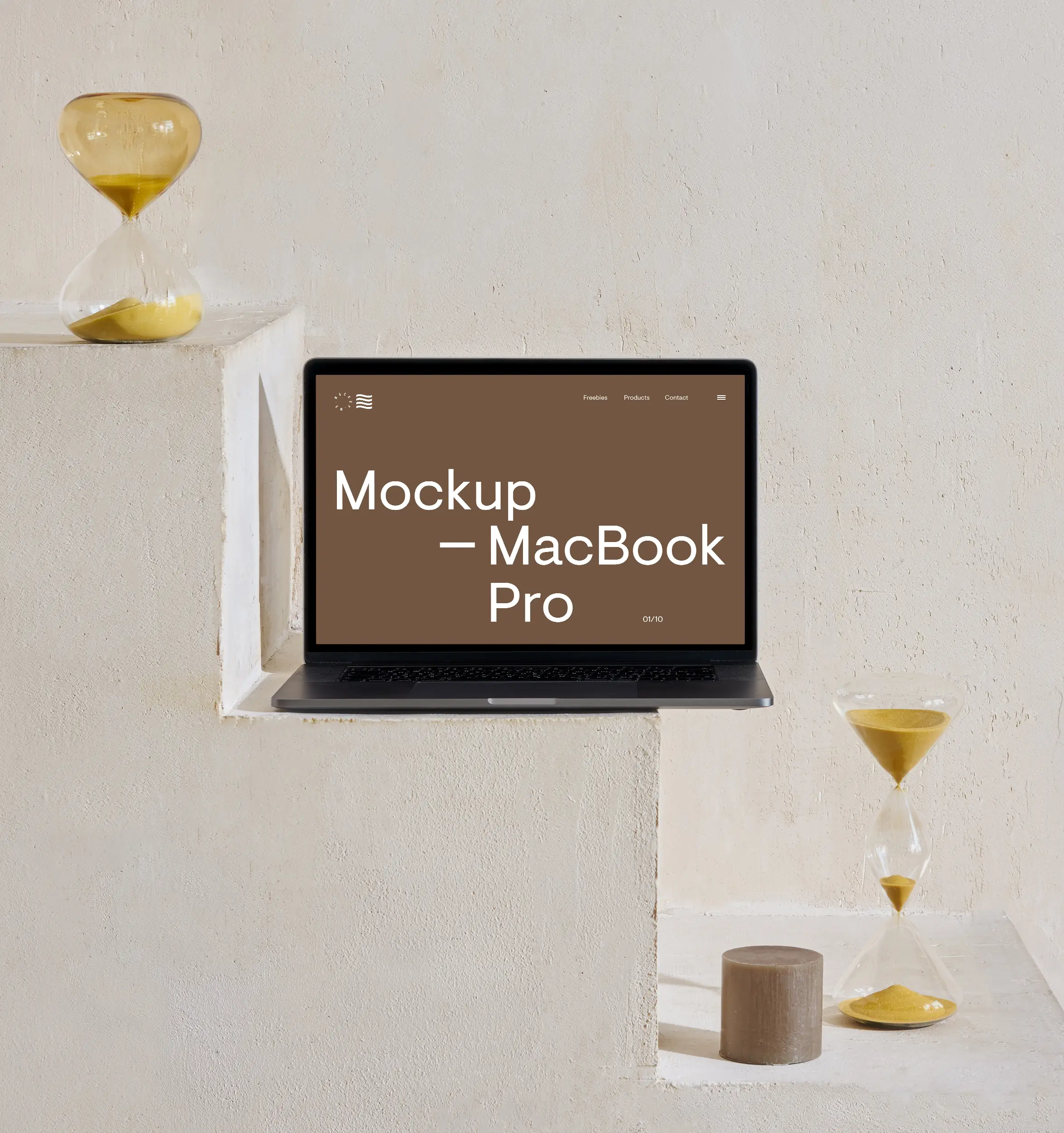 A MacBook Pro standing on white plaster stairs between two hourglasses